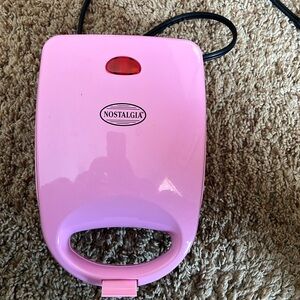 Nostalgic cupcake baker. Pink in color works great.